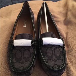 Coach black loafers. Size 9. Never worn.